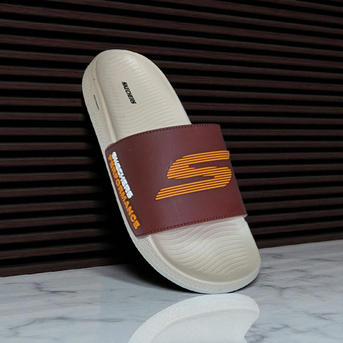 1 ) Skechers Performance Slide – Ultra Soft EVR Sole with Foam Cushioning Inside